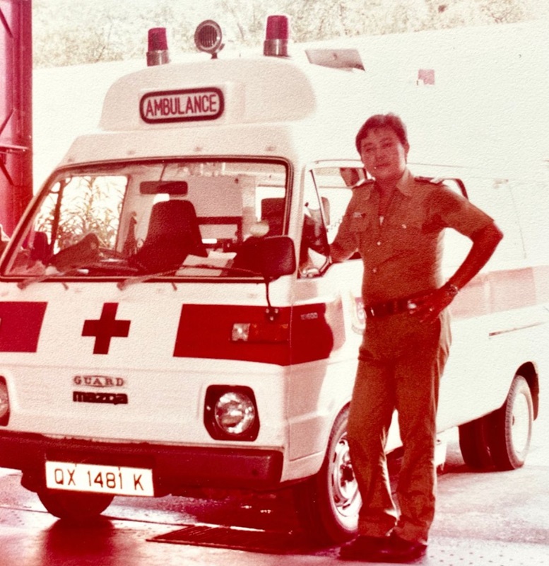 Mr Wong with the Mazda Guard ambulance at Central Fire Station