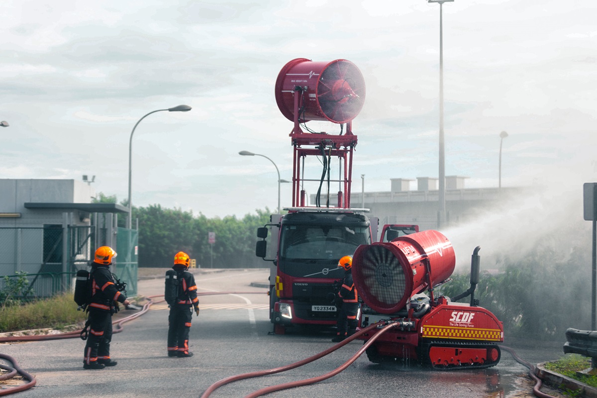 SCDF’s Ventilation Vehicle (left) introducing water mist to disperse chemical vapours during Exercise Northstar XI