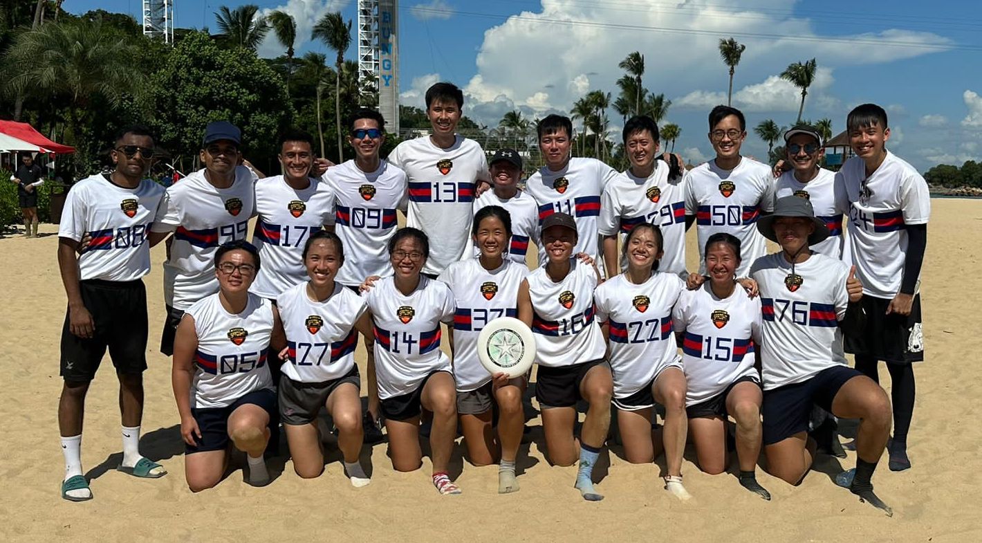 SGT3 Hatadi (back row, 3rd from left) with the SCDF Frisbee Teams at the Public Service Mixed Beach Frisbee Tournament in June 2023