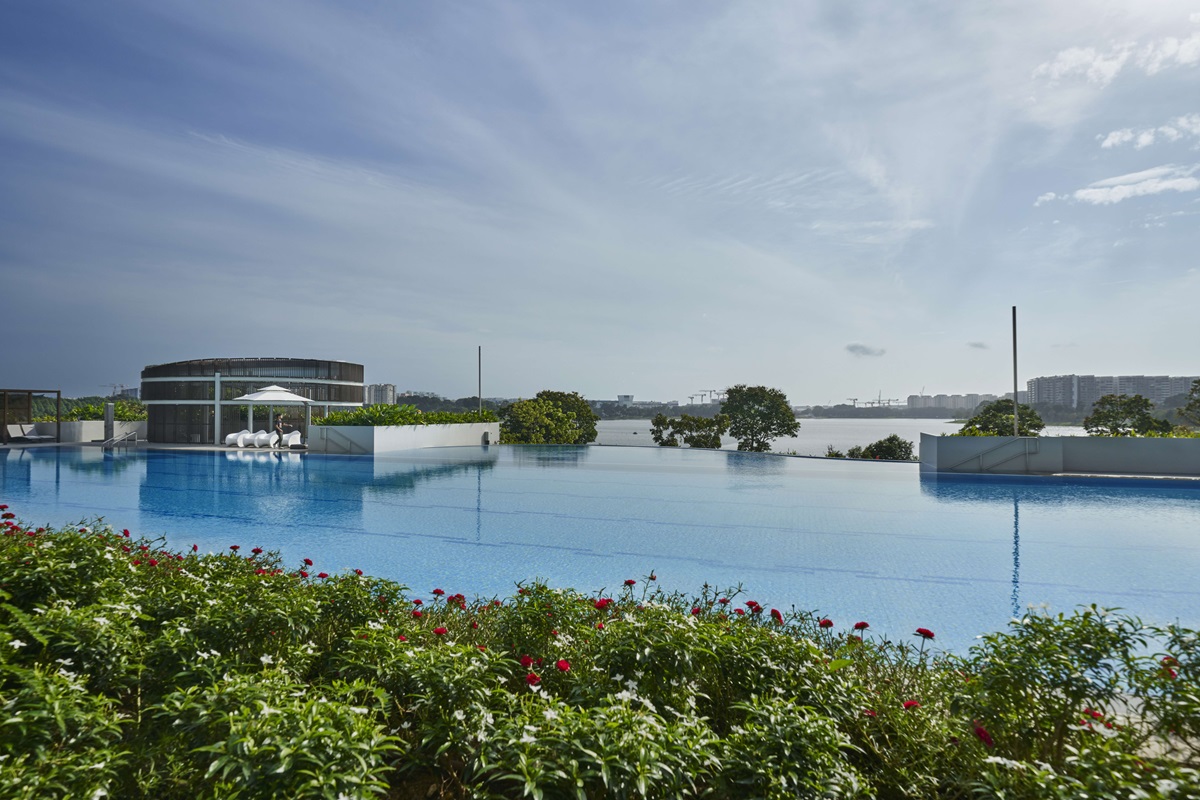 A 6-lane 50-meter infinity pool overlooking the reservoir, located at Level 2 of the clubhouse, is available for those who wish to relax Source: HomeTeamNS
