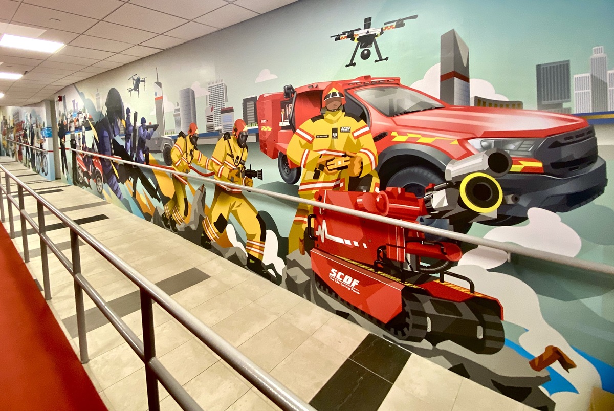 A 3-dimensional mural of the HomeTeamNS clubhouse near the entrance