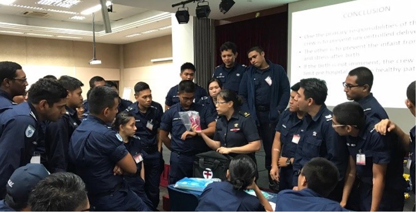 LTC Carolyn (centre) conducting a lecture for the Paramedic Trainees from several batches ago