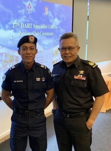 SGT3 Shafiq (left) with his father SGT3 Jaais (right) at the 27th DART Specialist Course Passing Out Ceremony