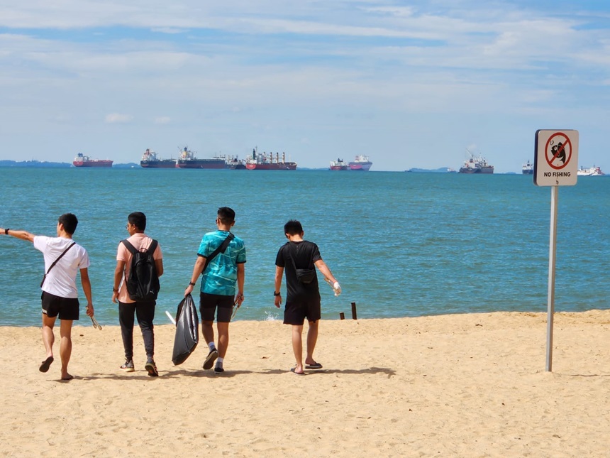 cleaning up the beach at East Coast Park