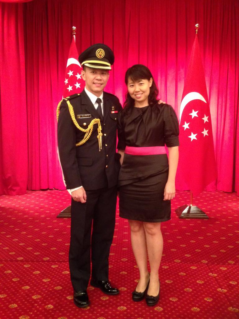 LTC(NS) Wong Wee Liam with his spouse at a HADC appointment ceremony in 2017.