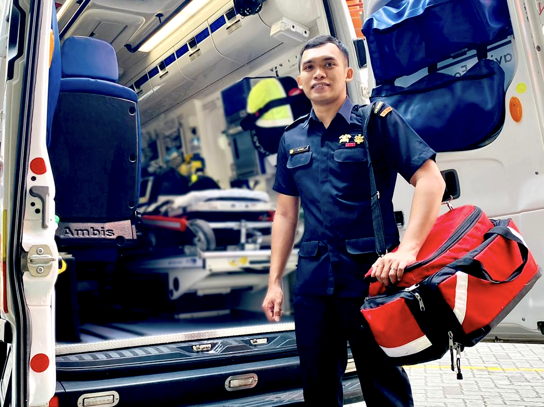 Emergency Medical Technician (EMT) SSG Mohammad Aliff Bin Rosli with the Jump Bag, a vital instrument that contains various medical equipment required for every emergency response.